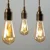 amber-led-filament-pear-bulb-e27.webp